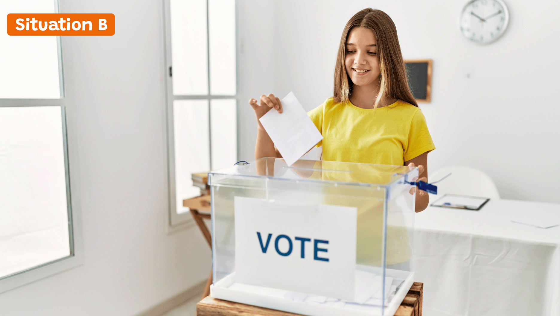 Une élève dépose son bulletin de vote pour les élections des députés de classe.